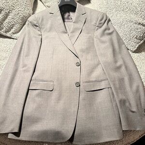 Three ZZegna suits. All size 40 and in great condition. Selling as a set.